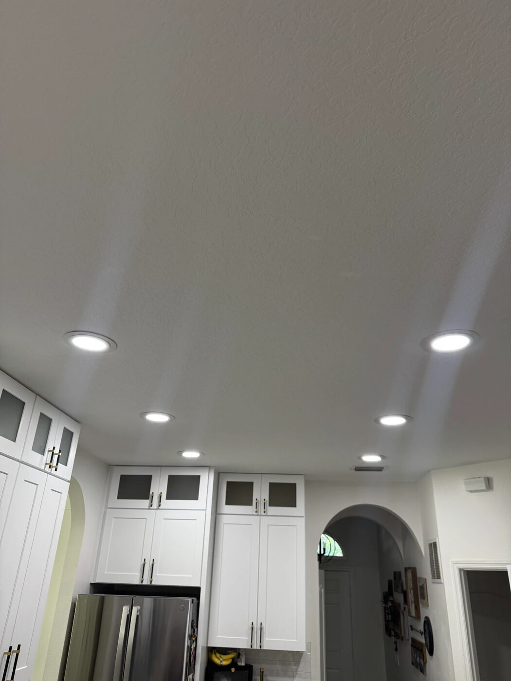 Kitchen ceiling with six new recessed LED can lights