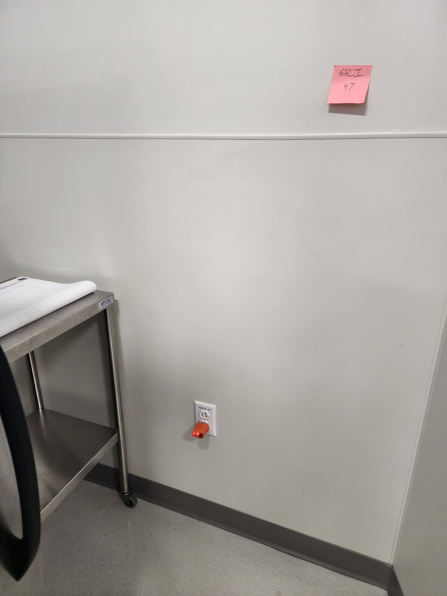 Commercial GFCI receptacle tested with a plug tester