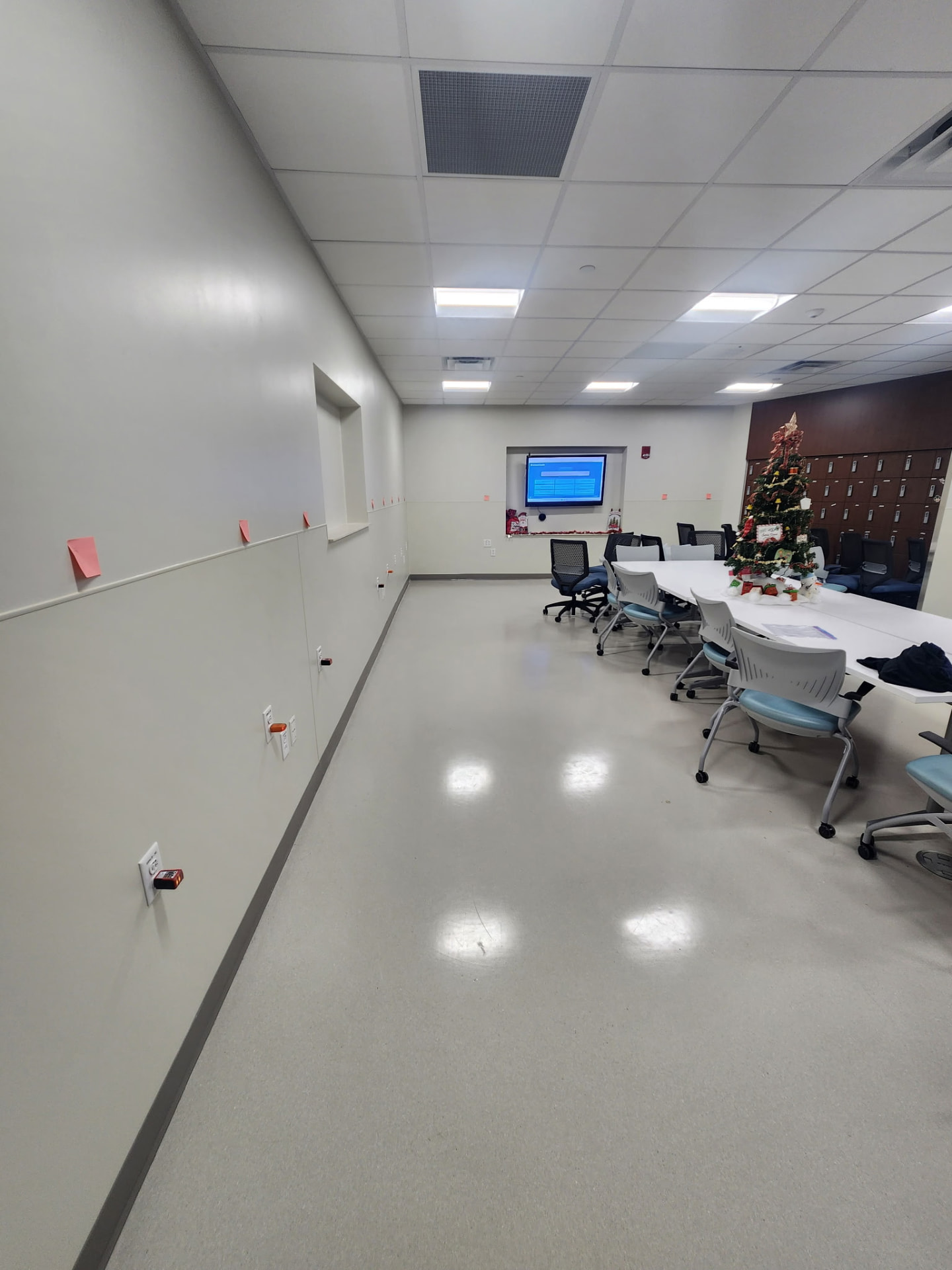 Commercial room with labeled circuits and installed wall devices